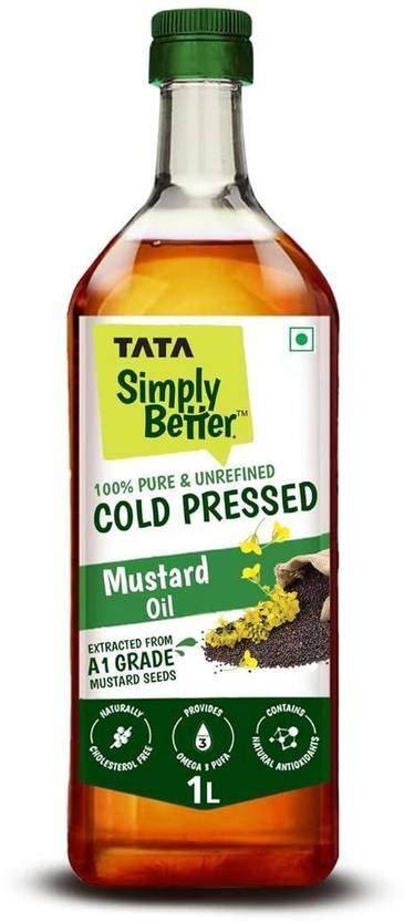 Delivery trucks carrying Tata edible oil bottles demonstrating supply chain role in pricing.
