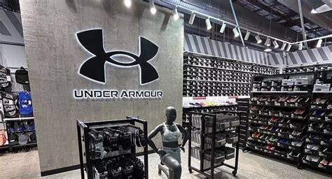 Photo of an Under Armour store interior focusing on direct-to-consumer athletic shoes display.